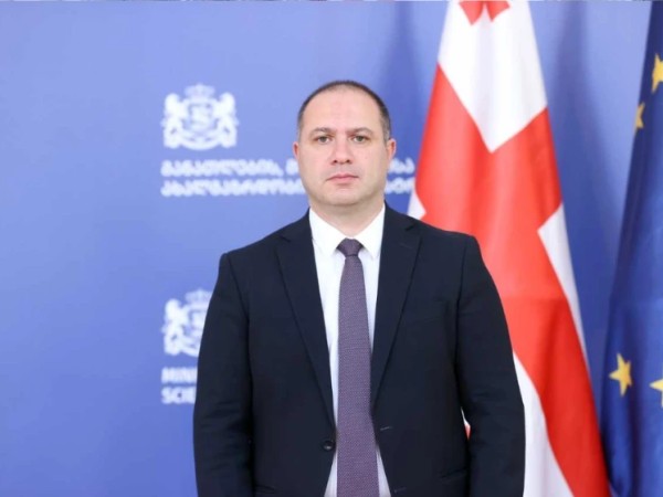 მი
