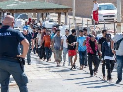 მიგრანტები