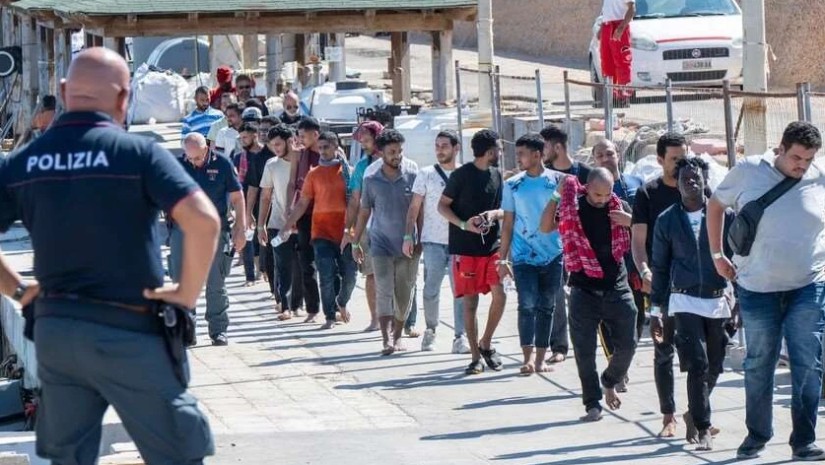 მიგრანტები