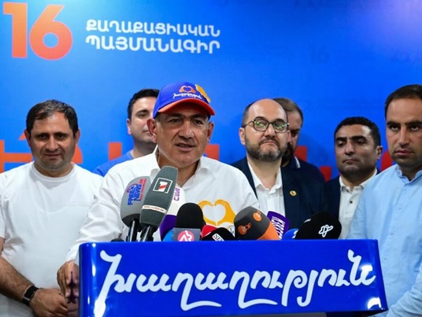 მი