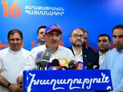 მი