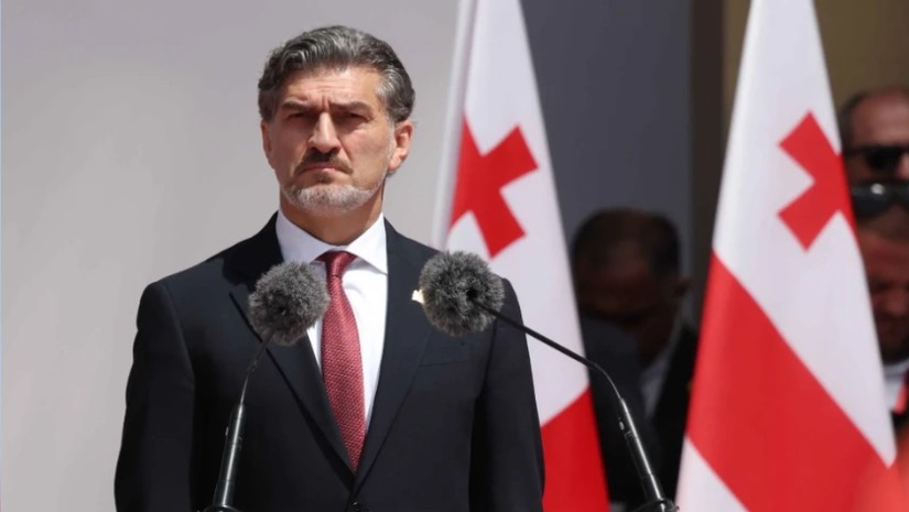 მი