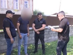 დაკავება