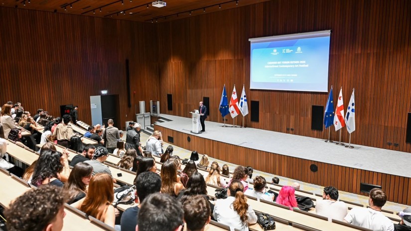 კიუ