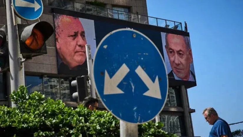 მი